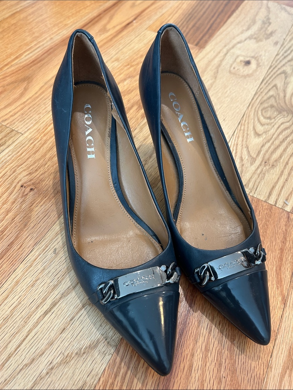 Coach Navy Leather Pointed Toe Chain-Plate Pumps